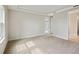 Cozy main bedroom featuring plush carpet and plenty of natural light at 3448 Yellow Leaf Cir, Spring Hill, FL 34609