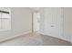 Bedroom featuring closet doors and carpet with natural light from the window at 3458 Yellow Leaf Cir, Spring Hill, FL 34609