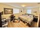 Simple bedroom with hardwood floors, natural light, and closet space at 3542 Monticello St, New Port Richey, FL 34652