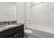 Full bathroom features a granite vanity and a shower and bathtub combo at 3762 Mossy Limb Ct, Palmetto, FL 34221