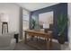 An office features natural lighting and a desk with storage at 3762 Mossy Limb Ct, Palmetto, FL 34221
