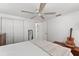 Comfortable bedroom featuring a bed, built in closet, and natural light for a peaceful atmosphere at 4922 Bola St, New Port Richey, FL 34652