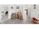 Hallway featuring a wine rack and views of the living room and kitchen at 4922 Bola St, New Port Richey, FL 34652