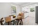 Eat-in kitchen featuring bright natural light and stainless steel appliances at 4922 Bola St, New Port Richey, FL 34652