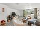 Cozy living room with modern furniture, neutral décor, and lots of natural light at 4922 Bola St, New Port Richey, FL 34652
