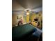 Comfortable bedroom with ceiling fan, carpet, and convenient closet access at 5247 81St N St # 2, St Petersburg, FL 33709