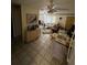 Inviting living room area with tile flooring and ample natural light at 5247 81St N St # 2, St Petersburg, FL 33709