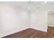 Large bedroom with wood floors and white trim with a ceiling fan at 534 Ladrone Ave, Tampa, FL 33606