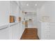 Bright and organized walk-in closet with custom shelving and ample storage space for clothes and accessories at 534 Ladrone Ave, Tampa, FL 33606