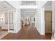 Grand foyer with hardwood floors, high ceilings, and an open view to the living room and second floor at 534 Ladrone Ave, Tampa, FL 33606