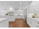 Modern kitchen with stainless steel appliances, custom cabinets and marble countertops at 534 Ladrone Ave, Tampa, FL 33606