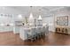 Bright and spacious kitchen with an oversized center island, white cabinetry, and stainless steel appliances at 534 Ladrone Ave, Tampa, FL 33606