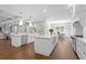 Spacious kitchen with a large island, stainless steel appliances, and hardwood floors at 534 Ladrone Ave, Tampa, FL 33606