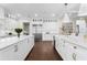 A bright and modern kitchen with stainless steel appliances and custom cabinetry at 534 Ladrone Ave, Tampa, FL 33606