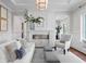 Bright living room featuring a modern fireplace, plush seating, and elegant decor at 534 Ladrone Ave, Tampa, FL 33606