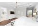 Bright and spacious main bedroom featuring hardwood floors and ample natural light at 534 Ladrone Ave, Tampa, FL 33606