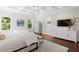 Spacious main bedroom with coffered ceilings, ample natural light, and modern decor at 534 Ladrone Ave, Tampa, FL 33606