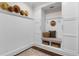 Mudroom complete with storage, bench seating, and hooks for organizing outerwear at 534 Ladrone Ave, Tampa, FL 33606