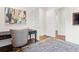 Charming office space with a gray rug, desk, and decorative painting on the wall at 534 Ladrone Ave, Tampa, FL 33606