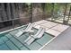 Secluded pool featuring a water feature, lounge chairs, and elegant tiling at 534 Ladrone Ave, Tampa, FL 33606
