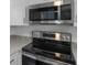 Close up of the modern stainless steel appliances found in the kitchen area at 5611 Burlington N Ave, St Petersburg, FL 33710