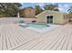 Backyard pool with deck area, and nearby fenced yard at 5611 Burlington N Ave, St Petersburg, FL 33710