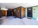 View of carport featuring a covered area with storage and access to the home's side entrance at 6411 S Clark Ave, Tampa, FL 33616