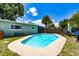 Enjoy the inviting backyard pool and patio, perfect for relaxation and outdoor entertainment at 6411 S Clark Ave, Tampa, FL 33616