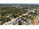 Aerial view showing the property's convenient location on a tree-lined street with easy access to nearby amenities at 6453 5Th N Ave, St Petersburg, FL 33710