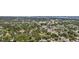 An aerial view of a residential neighborhood with tree-lined streets and well-maintained homes at 6453 5Th N Ave, St Petersburg, FL 33710