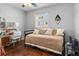 Bedroom featuring a desk, a day bed, and hardwood floors at 6453 5Th N Ave, St Petersburg, FL 33710