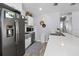 Well-appointed kitchen features stainless steel appliances and a breakfast bar at 6453 5Th N Ave, St Petersburg, FL 33710