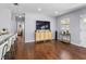 Open-concept living room with hardwood floors and modern furnishings at 6453 5Th N Ave, St Petersburg, FL 33710
