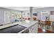 Open-concept living space featuring kitchen island and modern furnishings at 6453 5Th N Ave, St Petersburg, FL 33710