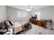 Bedroom with carpeting and a large TV at 7244 Wild Oak Ln, Land O Lakes, FL 34637