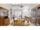 Formal dining room featuring a large table and traditional furniture at 7244 Wild Oak Ln, Land O Lakes, FL 34637