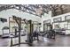 Modern gym featuring treadmills, weight machines, and a spacious layout for a comprehensive workout experience at 7244 Wild Oak Ln, Land O Lakes, FL 34637