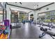 Bright community gym with weight machines, stationary bikes, free weights and large windows at 7244 Wild Oak Ln, Land O Lakes, FL 34637
