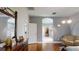 The main bedroom features hardwood floors, a walk-in closet, and ensuite bathroom at 7244 Wild Oak Ln, Land O Lakes, FL 34637