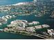 An aerial view of waterfront condos set in an urban landscape at 7665 Sun Island Dr # 206, South Pasadena, FL 33707