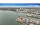Stunning aerial view of waterfront condos with bay views and surrounding landscape at 7665 Sun Island Dr # 206, South Pasadena, FL 33707