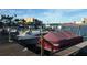 Dock with multiple boats, providing convenient access to the water for boating enthusiasts at 7665 Sun Island Dr # 206, South Pasadena, FL 33707