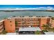 A charming condo building with bay views and a convenient covered parking area at 7665 Sun Island Dr # 206, South Pasadena, FL 33707
