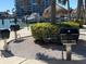 Community grilling area with multiple grills, perfect for outdoor cooking and entertaining near the docks at 7665 Sun Island Dr # 206, South Pasadena, FL 33707