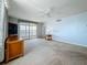 Living Room with sliding glass door to exterior at 7665 Sun Island Dr # 206, South Pasadena, FL 33707