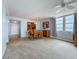 Living area adjacent to the kitchen and dining area at 7665 Sun Island Dr # 206, South Pasadena, FL 33707