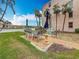 Cozy patio area perfect for relaxation and enjoying waterfront views in this serene condo community at 7665 Sun Island Dr # 206, South Pasadena, FL 33707