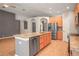Open kitchen with stainless steel appliances and a central island for entertaining at 826 Addison Ne Dr, St Petersburg, FL 33716