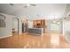 Open-concept kitchen and living area with stainless steel appliances and island at 826 Addison Ne Dr, St Petersburg, FL 33716