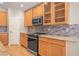 Kitchen featuring stainless steel appliances and stone countertops at 826 Addison Ne Dr, St Petersburg, FL 33716